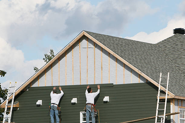 Professional Siding Installation technician working in Normalville, PA